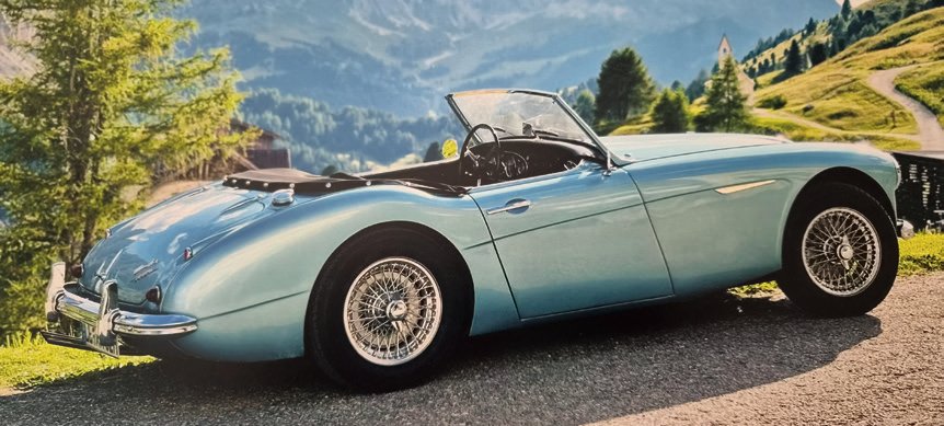 Hellblauer Austin-Healey 3000 Mk I in Berglandschaft